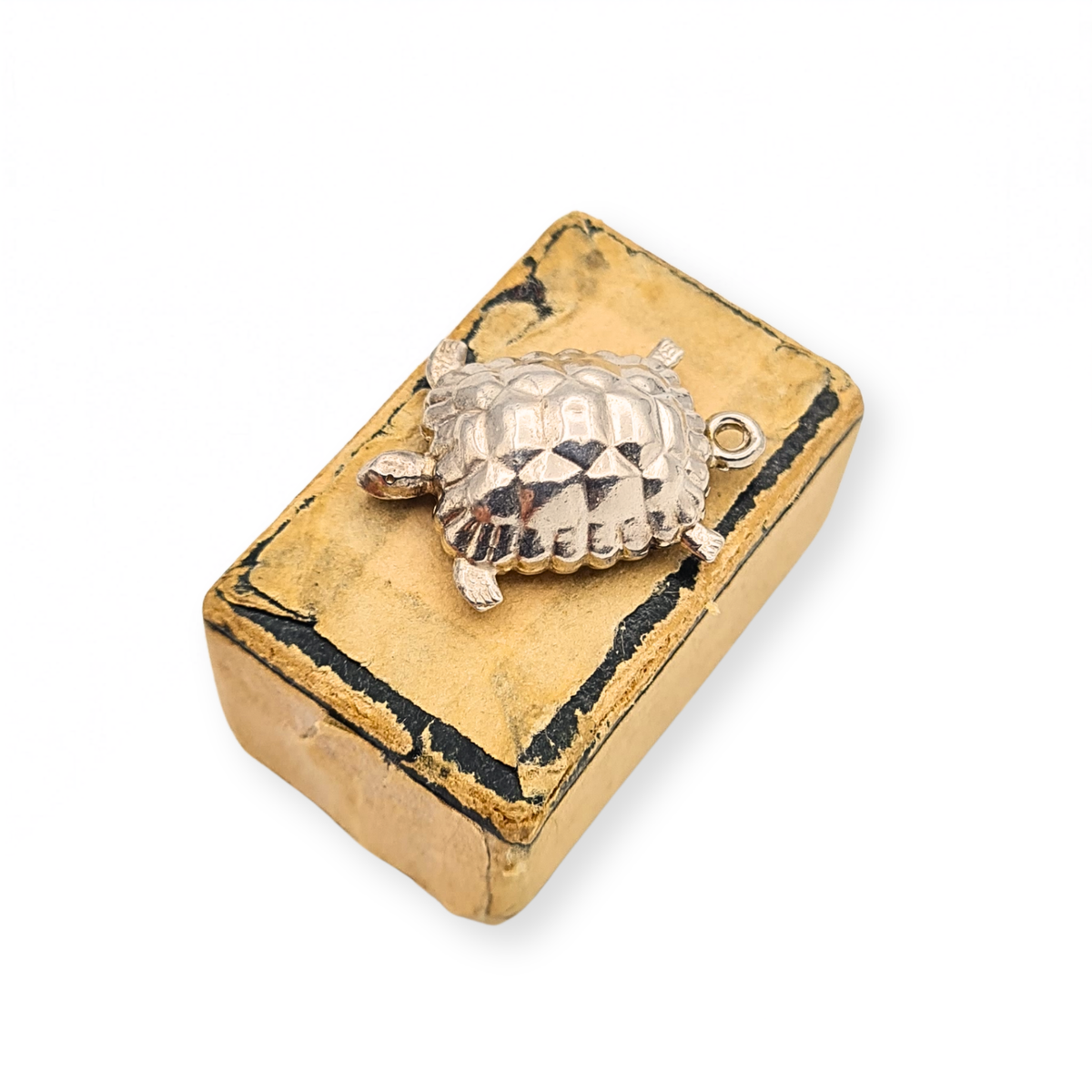 Sterling silver sea turtle charm with textured shell, detailed flippers and small hanging loop