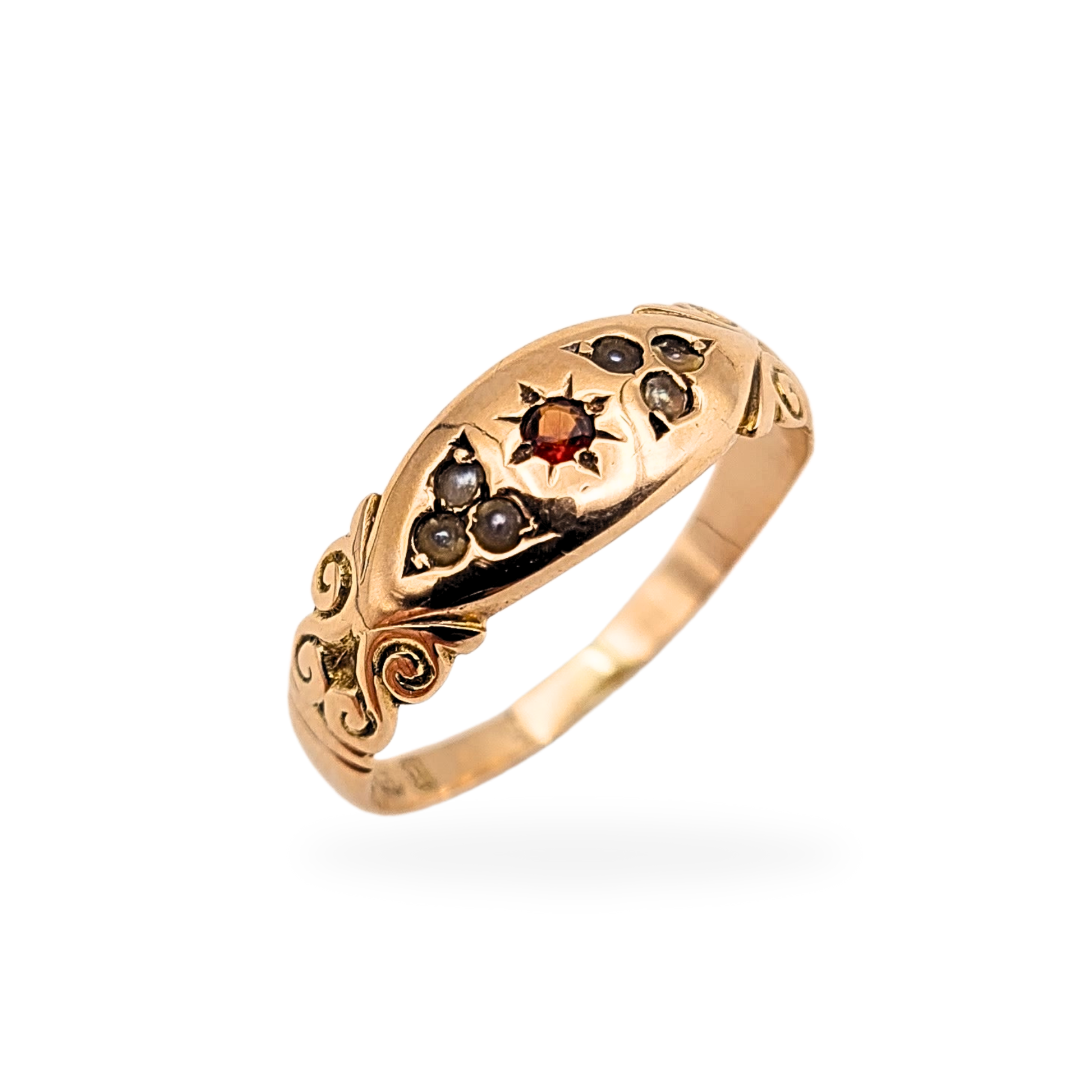 Antique 9ct rose gold ring featuring a central garnet and seed pearls in a starburst setting, hallmarked Birmingham 1847, engraved scroll shoulders, UK size P 1/2 US 7 3/4, showing age-related pearl wear but full of character and charm.