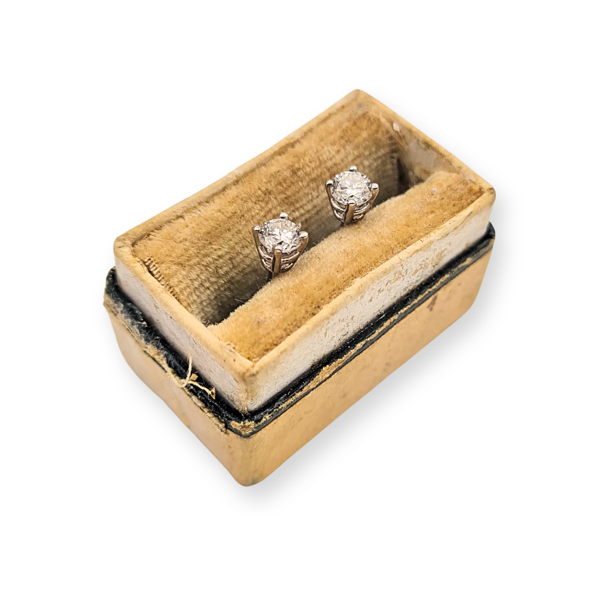 Pair of 18ct white gold diamond stud earrings featuring round brilliant cut diamonds measuring approximately 3.5mm set in classic four claw solitaire settings. Fully British hallmarked with 11mm posts and butterfly backs, elegant minimalist diamond studs.