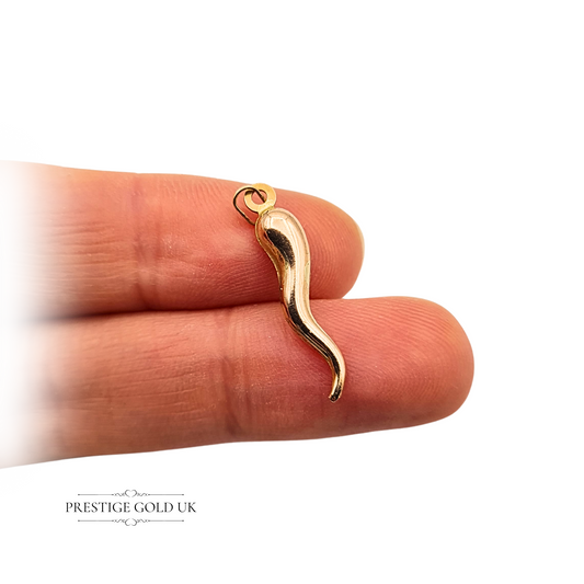 Vintage 9ct gold Horn of Plenty charm pendant with a curved hollow body, stamped 9k and tested for gold content, polished finish, 23mm tall, symbolic of good fortune and abundance, perfect as a talisman or lucky charm.