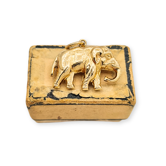 Vintage 9ct gold hollow puffy elephant charm with raised trunk, fully British hallmarked 1973.