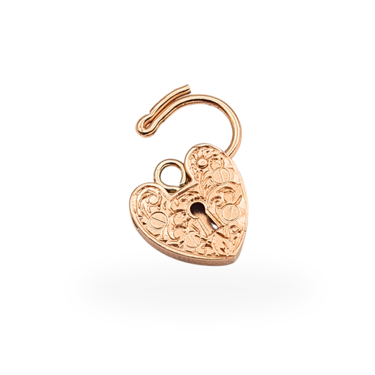 Vintage 9ct rose gold opening heart padlock charm with hand engraved floral decoration and 375 hallmark.