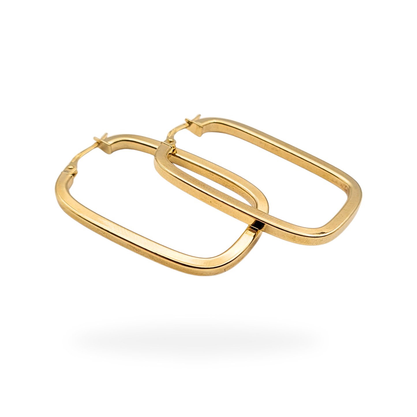 Pair of fully hallmarked 9ct yellow gold oblong hoop earrings with secure flip-top fasteners, measuring 38mm tall by 24mm wide and 2.5mm thick, weighing 2.25g. Elegant geometric rectangular design photographed on model and against ruler for scale.