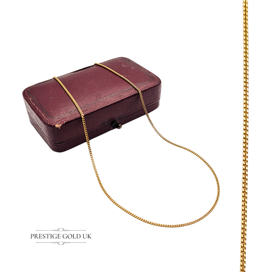 9ct gold narrow curb chain necklace, fully British hallmarked, measuring 18 1/2" (47cm) long and 1.2mm wide, weighing 2.1g, with a secure spring ring clasp — a fine and elegant unisex gold chain ideal for layering or everyday wear.
