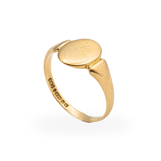 Solid 9ct gold oval signet ring with smooth polished face, fully British hallmarked 1955, UK M½, US 6½.