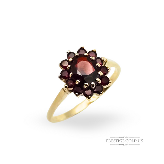 1973 vintage 9ct gold garnet ring featuring a central oval garnet surrounded by 12 smaller red garnets in a floral cluster setting, London hallmark, UK size S / US size 9, elegant retro birthstone ring, perfect gift for her