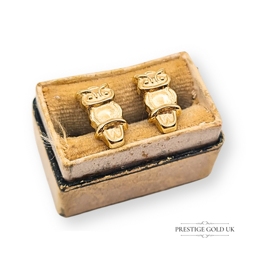 Pair of 9ct gold owl stud earrings, measuring 12mm tall by 6mm wide, with hollow lightweight design and butterfly backs, tested gold but not hallmarked, featuring detailed owl motif, charming animal-inspired jewellery.