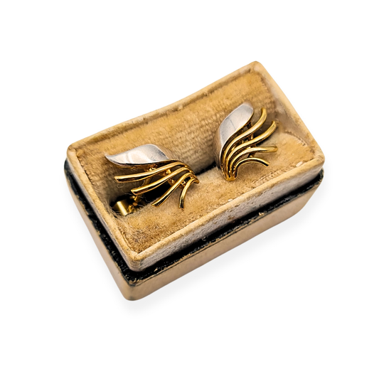 Pair of 9ct white and yellow gold wing-shaped earrings, fully British hallmarked and measuring 11mm x 8mm, shown from multiple angles and in scale for size. Lightweight 1.06g two-tone stud earrings with graceful sweeping design and butterfly backs.