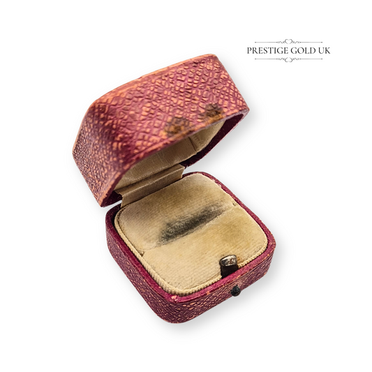Vintage red ring box with textured patterned exterior and cream velvet interior, measuring 40mm x 35mm x 30mm. Secure clasp closure, classic antique jewellery case ideal for engagement ring presentation or collectible storage.