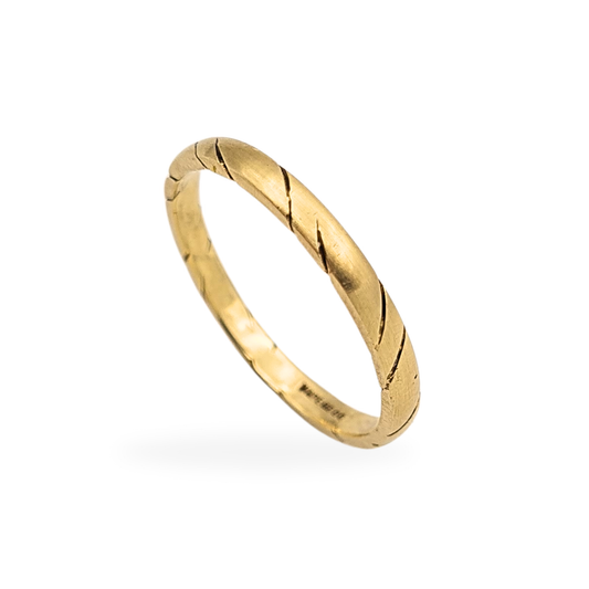 9ct yellow gold stacking ring with bark-patterned engraving and flat sides. Fully British hallmarked, solid gold band measuring 2mm wide, UK size N / US 6.5, weighing 1.46g. Minimalist textured ring ideal for stacking or daily wear.