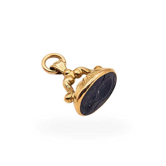 Vintage 9ct gold Centurion seal fob with black engraved intaglio and London hallmark.