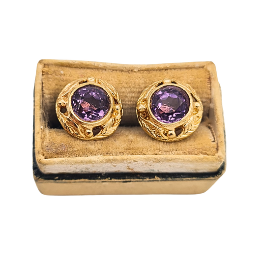9ct gold amethyst stud earrings with domed bezel set design and leaf detailing