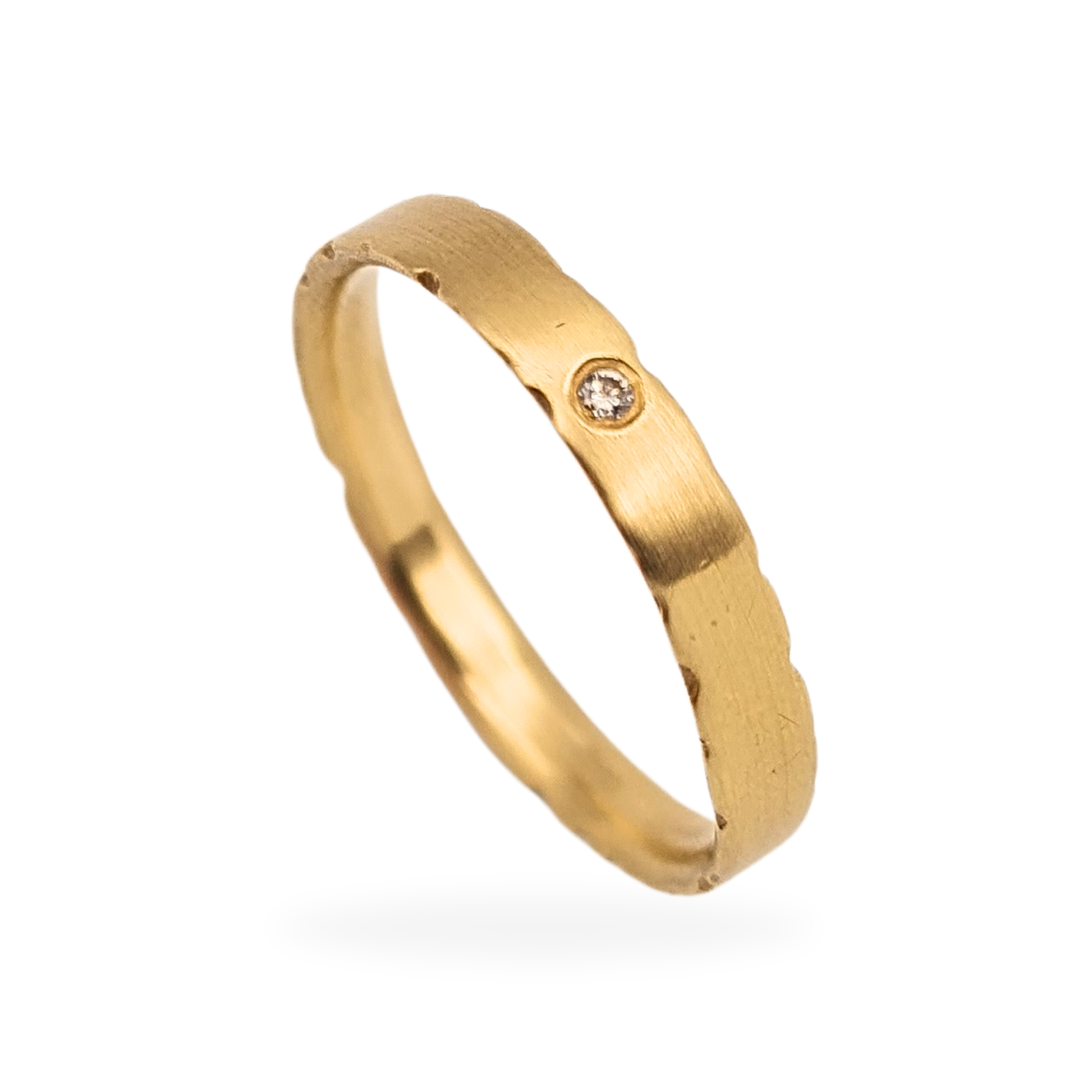 9ct brushed gold wedding ring with a single flush-set diamond, fully British hallmarked, comfort fit with rough-cut wave edge, 3mm wide, UK size O 1/2 US 7 1/2, elegant matte finish perfect as a wedding or stacking ring.