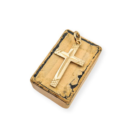 Small 9ct gold engraved cross pendant with diamond-cut detailing, fully British hallmarked, measuring 23mm by 13mm.