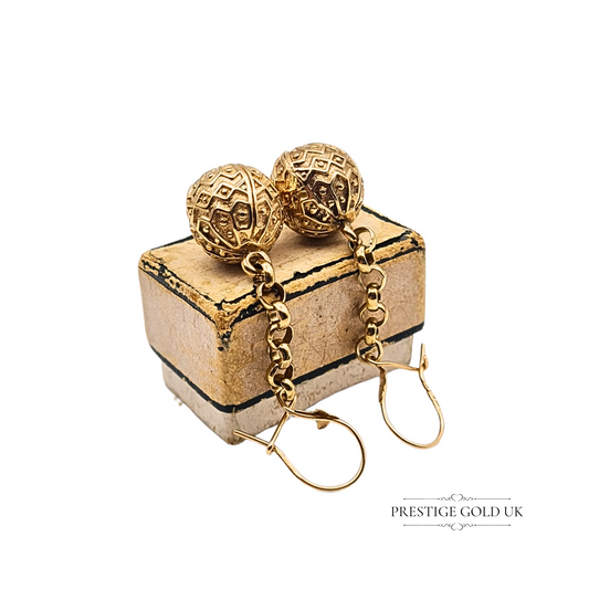 Pair of 9ct gold drop earrings with textured ball design, 44mm long and 11mm beads, Sheffield hallmarked 1996, solid gold chain detail, vintage 1990s style