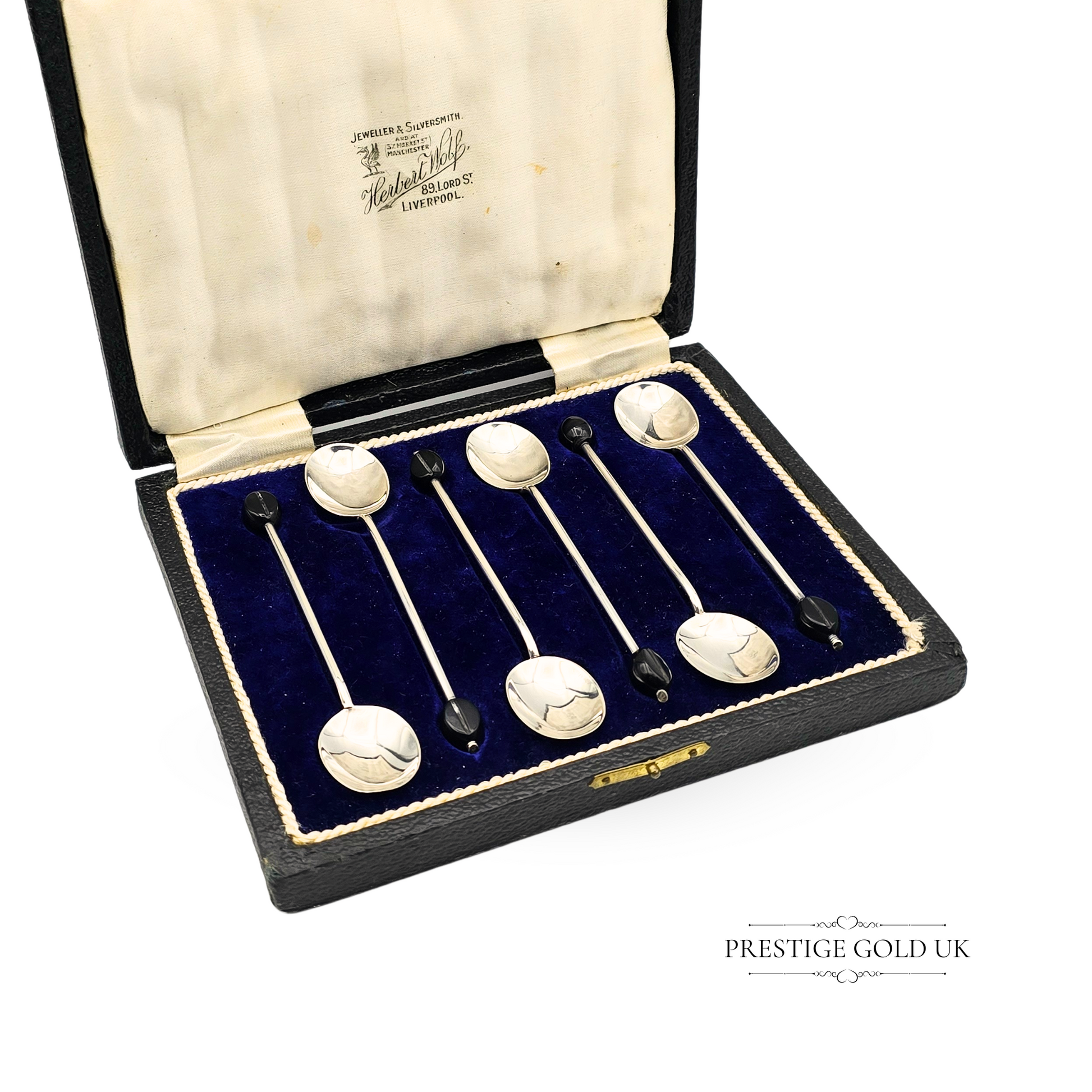 Antique sterling silver coffee spoon set crafted by C W Fletcher & Son Ltd, fully hallmarked Sheffield 1922, presented in original box from Herbert Wolf, 89 Lord Street, Liverpool; elegant 4-inch spoons ideal for collectors or vintage gift.
