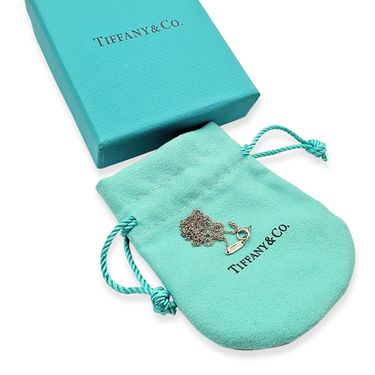 Authentic Tiffany & Co 18ct white gold necklace, 16 inches (41cm) long with fine 1mm belcher chain links, fully hallmarked AU 750 with Tiffany & Co branding, featuring a classic spring ring clasp, beautifully presented with Tiffany box and pouch.