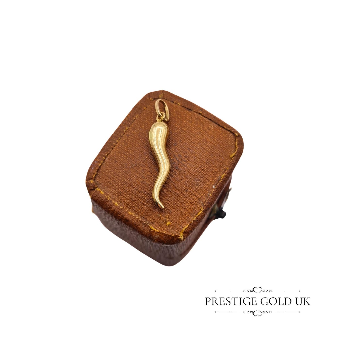 Vintage Italian Cornicello charm in 18ct gold, stamped 750, with a hollow Horn of Plenty design, 21mm tall, lightweight at 0.5g, perfect as a pendant or charm.