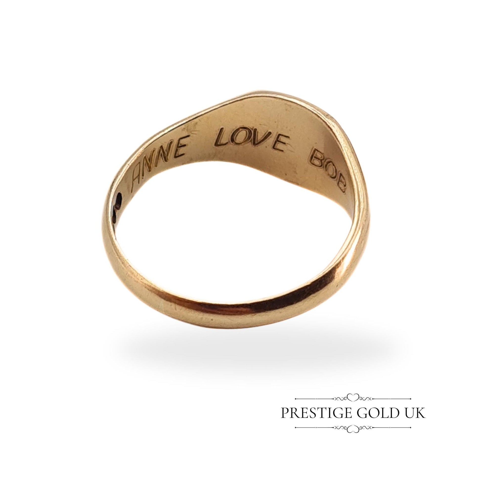 Inner view of the 9ct gold ring showing the engraved message &quot;Anne Love Bob,&quot; a sentimental and rare touch.