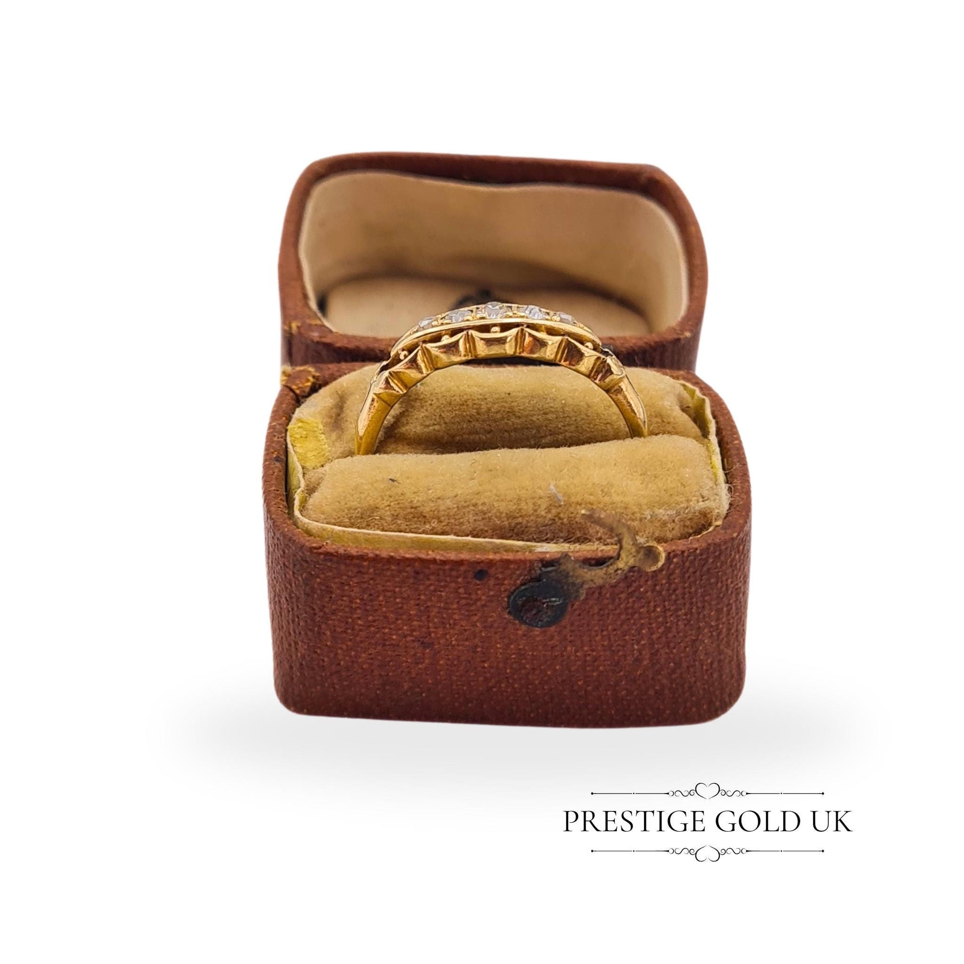 Antique boat ring in rich 18ct gold with five old-cut diamonds, displayed in a vintage presentation box.