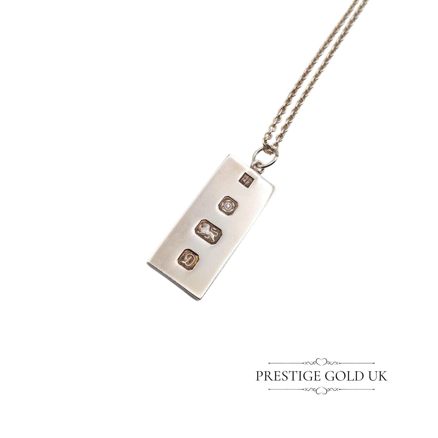 Vintage solid 925 sterling silver ingot pendant with a full Chester hallmark dated 1979, measuring 37mm tall and 15mm wide, on a 20-inch chain. A substantial 21.5g piece, perfect for vintage jewellery collectors or as a unique gift.