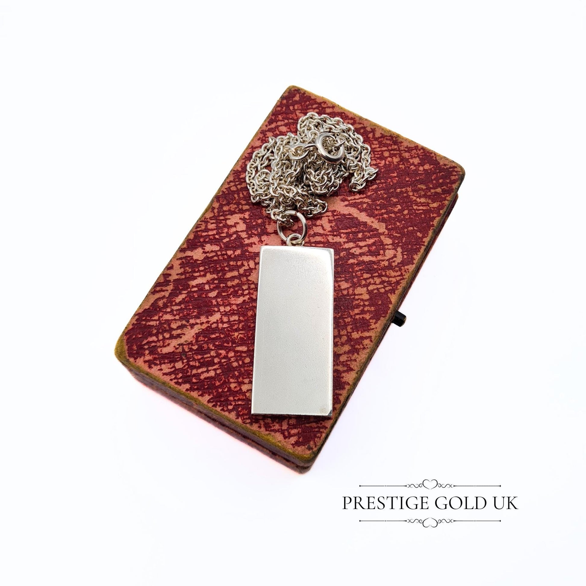 Vintage solid 925 sterling silver ingot pendant with a full Chester hallmark dated 1979, measuring 37mm tall and 15mm wide, on a 20-inch chain. A substantial 21.5g piece, perfect for vintage jewellery collectors or as a unique gift.