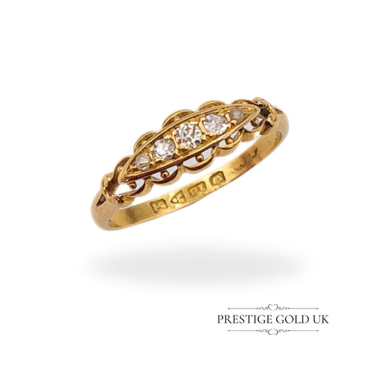 Antique 18ct gold boat ring featuring five old-cut diamonds in a scalloped Georgian-style setting, fully hallmarked for Chester, 1911.
